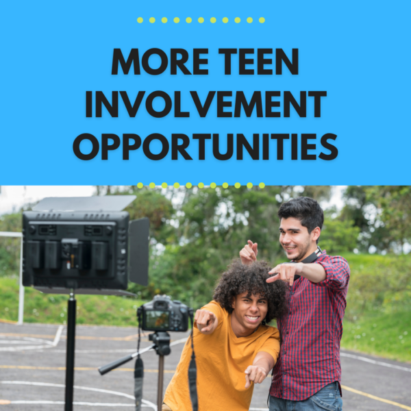 photo showing two teens in front on camera