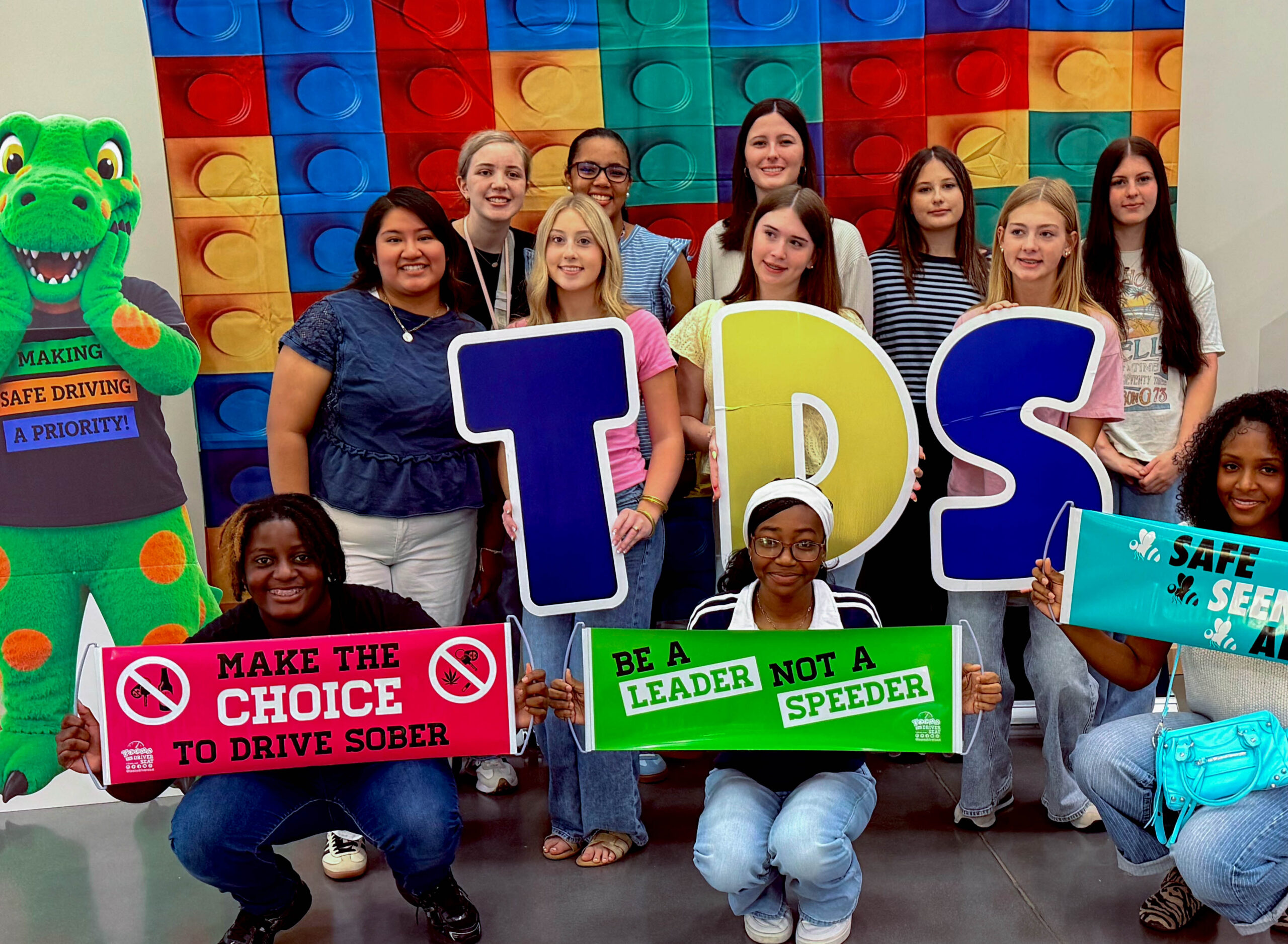 Group of teens posing at the GA Summit